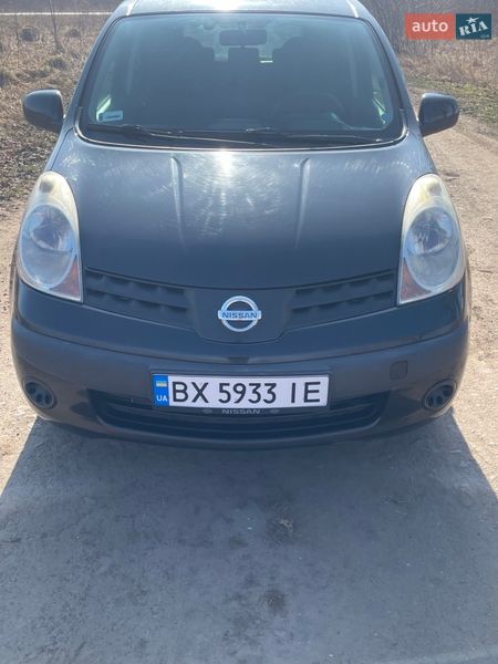 2006 Nissan Note, VIN SJNFAAE11U1050931:plate — фото 1 (autoria)