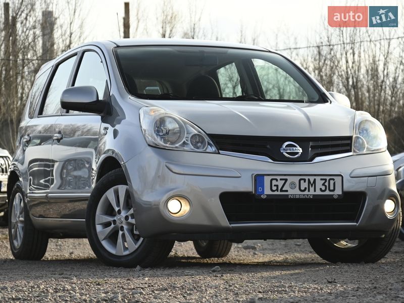 2009 Nissan Note, VIN SJNFAAE11U2023548:plate — фото 1 (autoria)