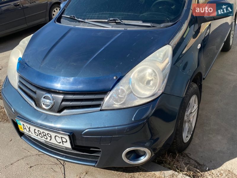 2012 Nissan Note, VIN SJNFAAE11U2166115:plate — фото 1 (autoria)
