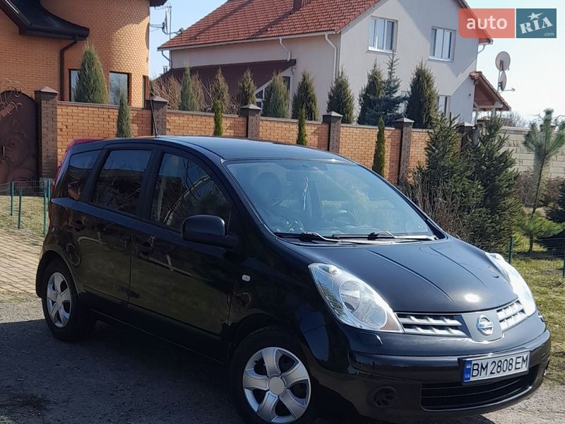 2008 Nissan Note, VIN SJNFAAE11U1310320:plate — фото 1 (autoria)