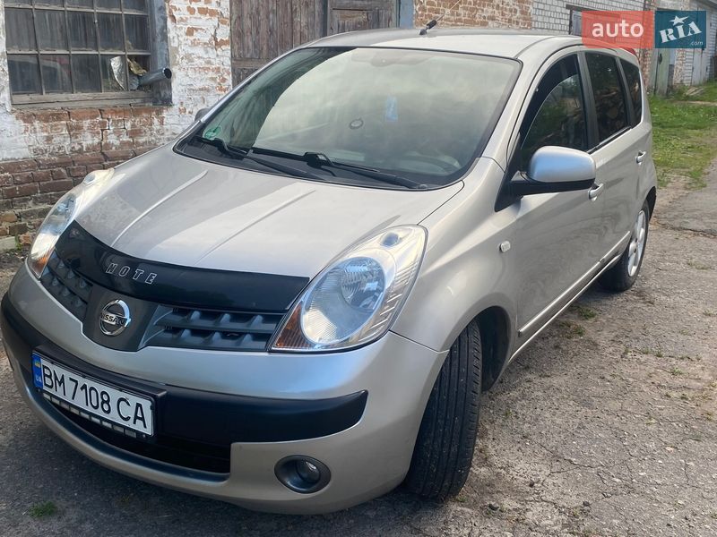 2006 Nissan Note, VIN SJNFAAE11U1061864:plate — фото 1 (autoria)