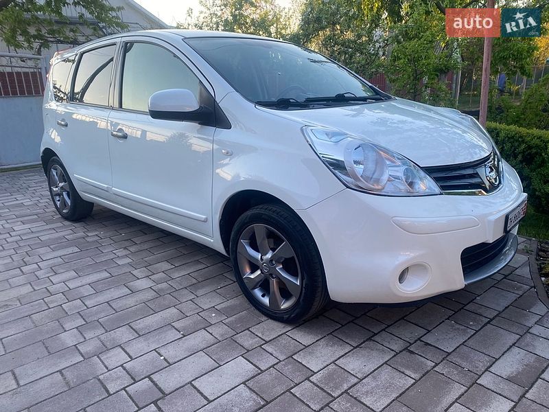 2011 Nissan Note, VIN SJNFCAE11U2096120:plate — фото 1 (autoria)