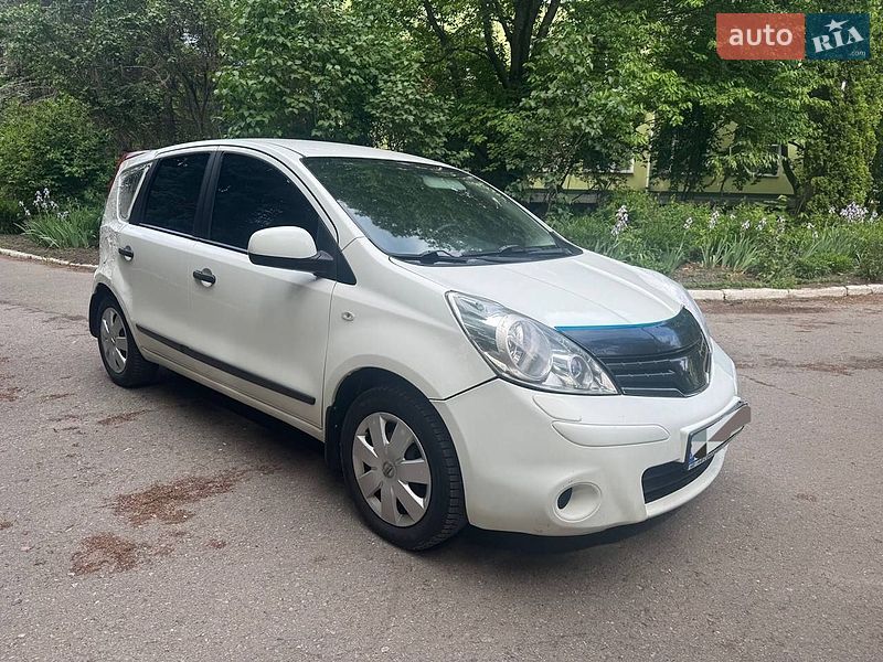 2012 Nissan Note, VIN SJNFAAE11U2157435:plate — фото 1 (autoria)