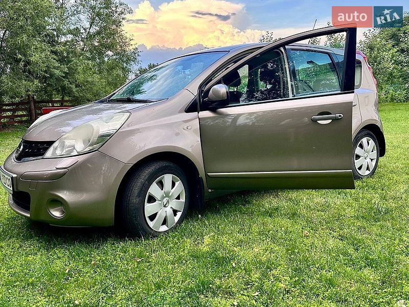 2011 Nissan Note, VIN SJNFDAE11U2106953:plate — фото 1 (autoria)