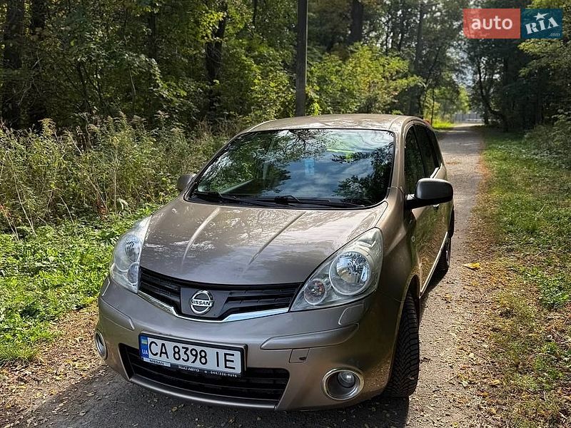 2012 Nissan Note, VIN SJNFCAE11U2155266:plate — фото 1 (autoria)