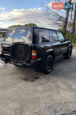 Внедорожник / Кроссовер Nissan Patrol 2003 в  фото 5 Внедорожник / Кроссовер Nissan Patrol 2003 в