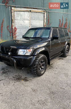 Внедорожник / Кроссовер Nissan Patrol 2003 в  фото 8 Внедорожник / Кроссовер Nissan Patrol 2003 в