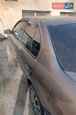 Седан Nissan Primera 1990 в 