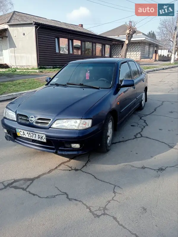 Nissan Primera 1998 VIN SJNBAAP11U0273991 фото оголошення 10 з 47