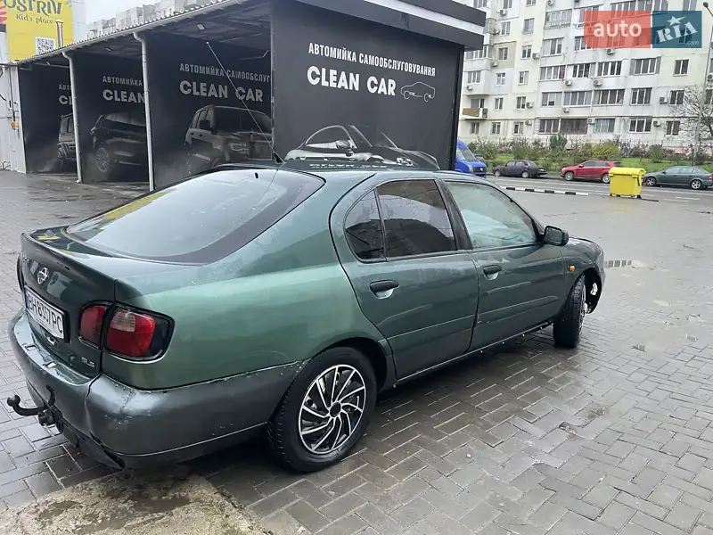 Nissan Primera 1999 VIN SJNFEAP11U0393714 фото оголошення 6 з 45
