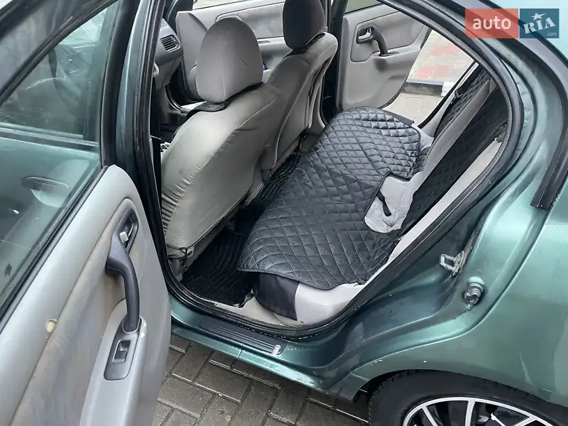 Nissan Primera 1999 VIN SJNFEAP11U0393714 фото оголошення 9 з 45