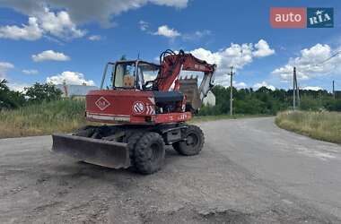 Екскаватор навантажувач O&K A30 1993 в 