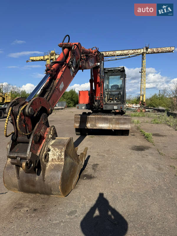 Колесный экскаватор O&K MH 5 2000 в Александрие фото Колесный экскаватор O&K MH 5 2000 в Александрие