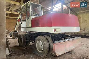 Екскаватор навантажувач O&K MH 5 1993 в 