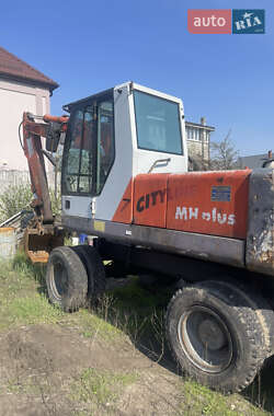 Колесный экскаватор O&K MH 2000 в 