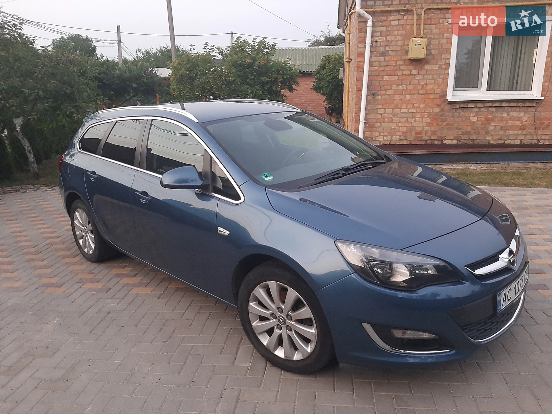 2014 Opel Astra - фото 1