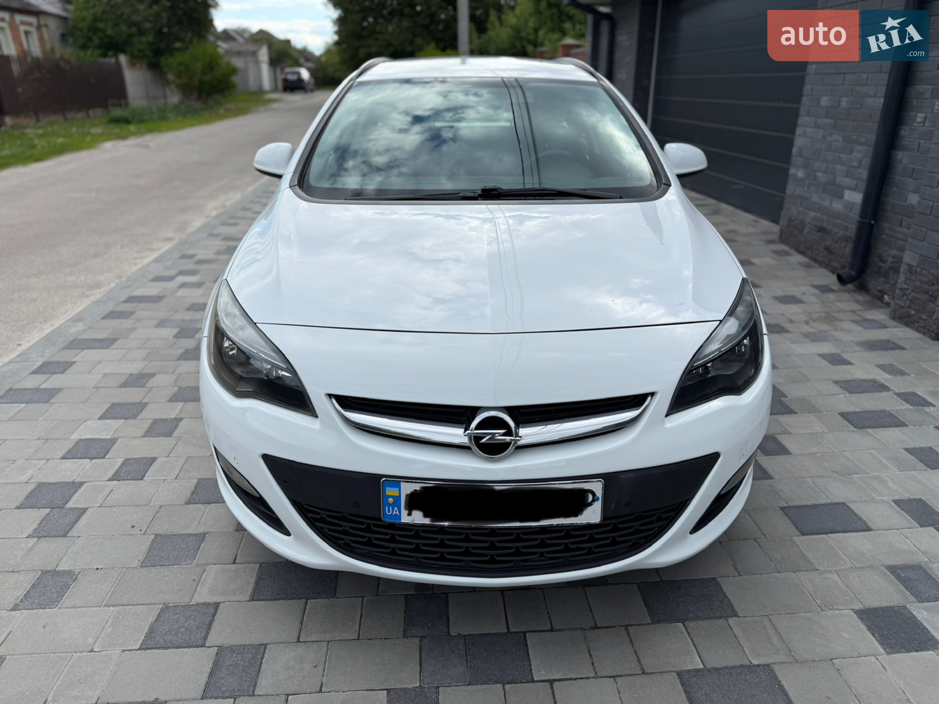 2014 Opel Astra - фото 1