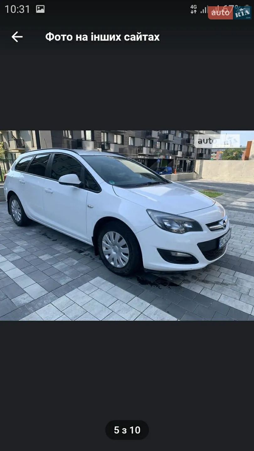 2014 Opel Astra - фото 1