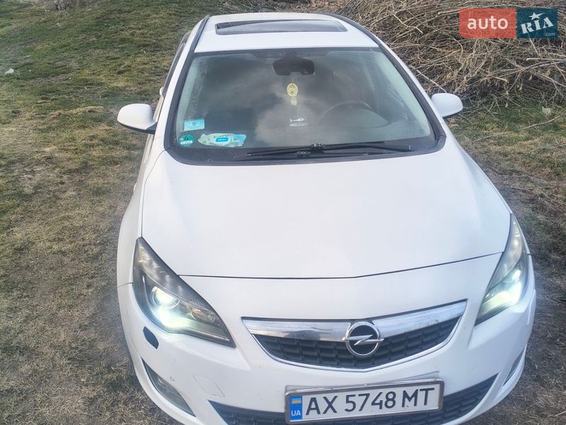 2012 Opel Astra, VIN W0LPD8EH1C8067114:plate — фото 1 (autoria)