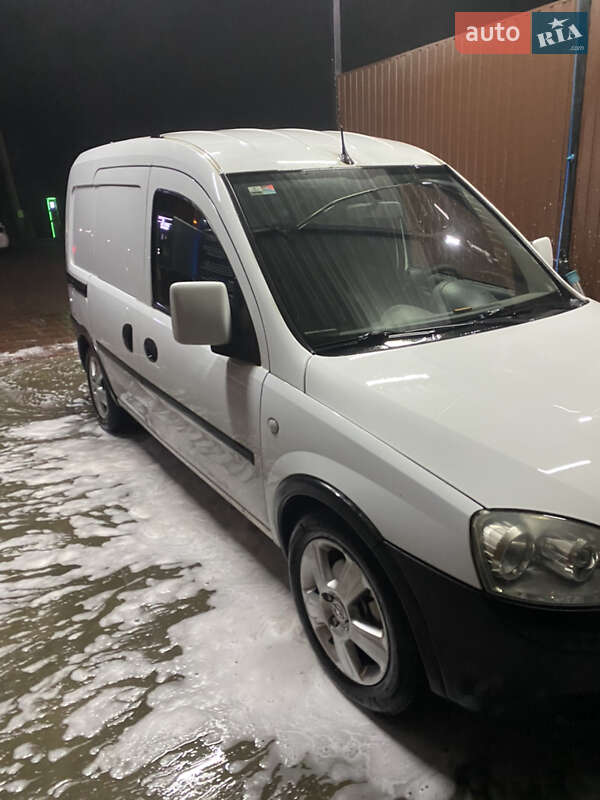 2011 Opel Combo, VIN W0LVXCF25B4411279:plate — фото 1 (autoria)