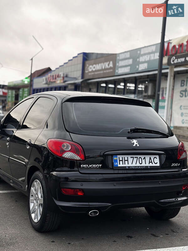 Хэтчбек Peugeot 206 plus 2009 в Подольске