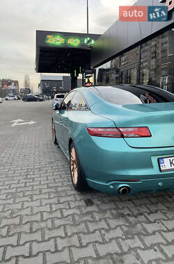 Купе Renault Laguna 2009 в 