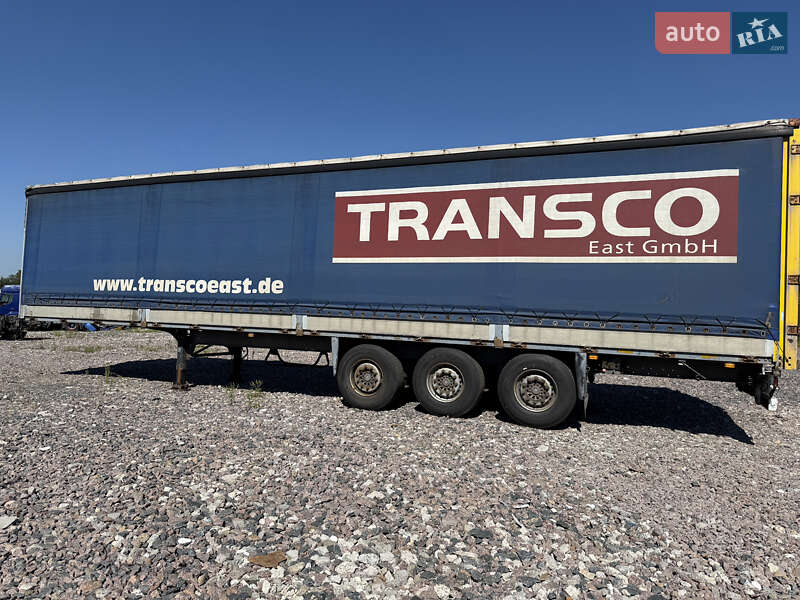 Бортовой полуприцеп Schmitz Cargobull S01 2002 в Киеве