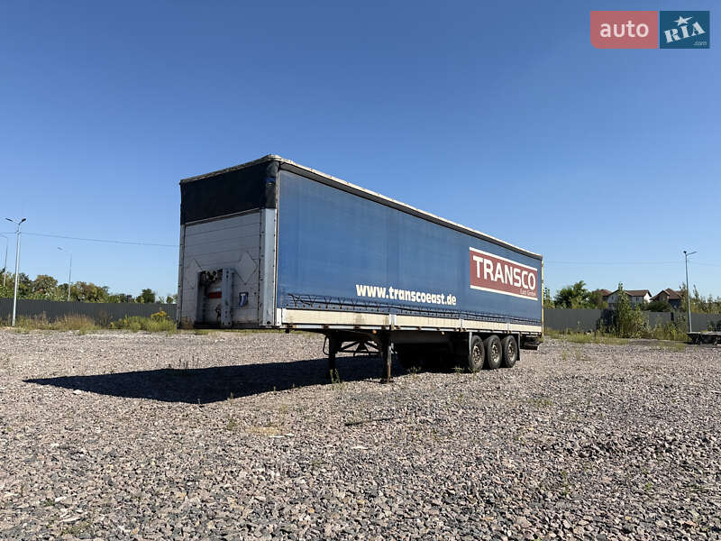Бортовой полуприцеп Schmitz Cargobull S01 2002 в Киеве