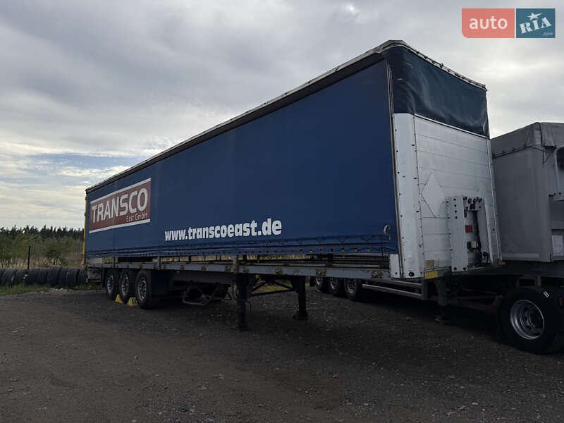 Бортовой полуприцеп Schmitz Cargobull S01 2002 в Киеве