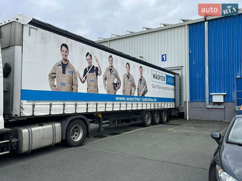 Бортовий напівпричіп Schmitz Cargobull SAF 2013 в Вінниці