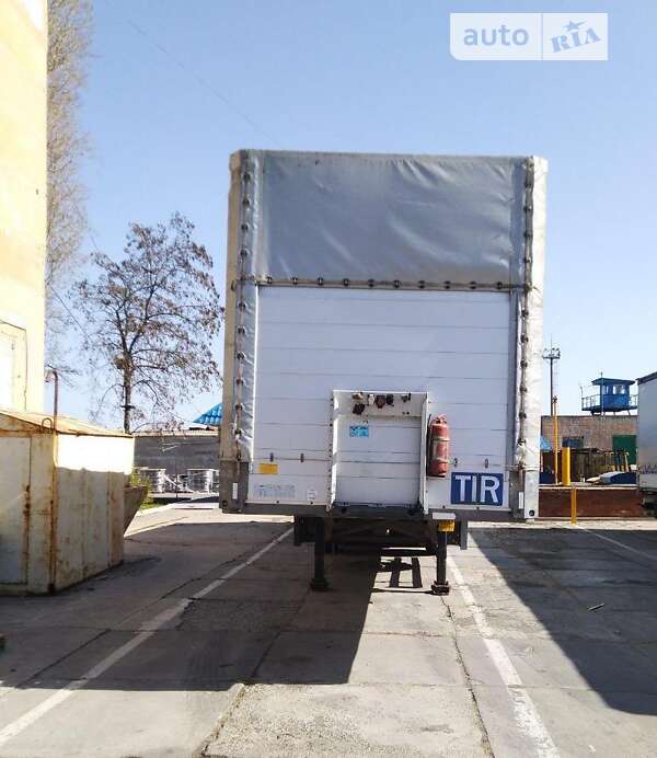 Бортовий напівпричіп Schmitz Cargobull SAF 2012 в Одесі