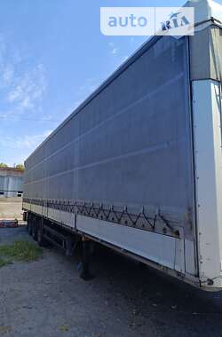 Тентований борт (штора) - напівпричіп Schmitz Cargobull SCS 2012 в 