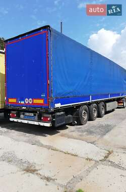 Бортовой полуприцеп Schmitz Cargobull SO1 2014 в 