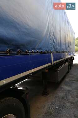 Бортовой полуприцеп Schmitz Cargobull SO1 2014 в 
