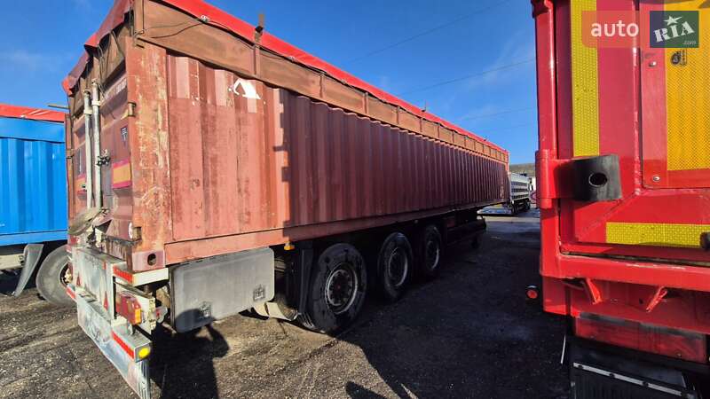 Зерновоз - полуприцеп Schmitz S-01 2003 в Шаргороде