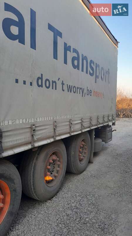Тентований борт (штора) - напівпричіп Schmitz S-01 2009 в Кам'янець-Подільському
