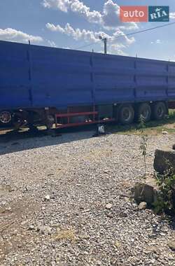 Бортовой полуприцеп Schmitz SCS 24 1999 в 