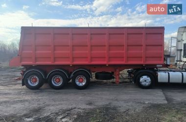 Самосвал полуприцеп Schmitz SKI 24 2004 в Ромнах