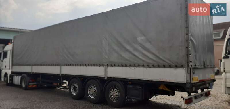 Бортовий напівпричіп Schwarzmuller J-Serie 2012 в Мукачевому