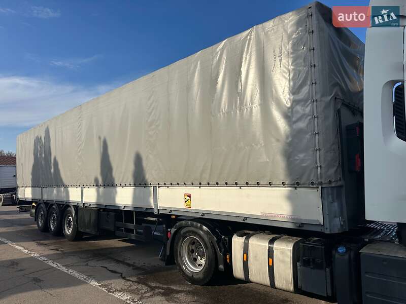 Бортовий напівпричіп Schwarzmuller J-Serie 2011 в Рівному