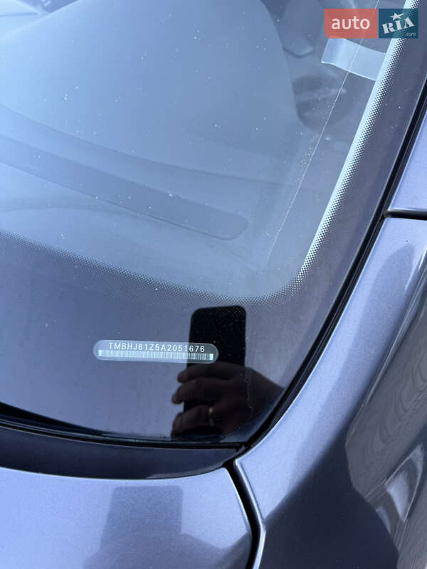 Универсал Skoda Octavia 2010 в Вишневом фото 3 Универсал Skoda Octavia 2010 в Вишневом