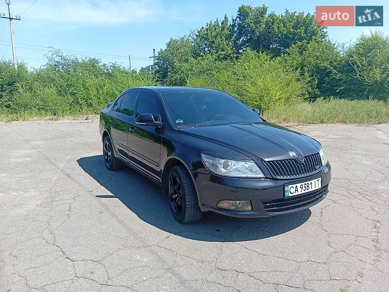 Skoda Octavia 2012 VIN TMBBK41Z0CB155566 фото оголошення 5 з 40