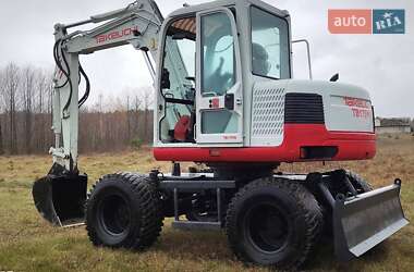Колесный экскаватор Takeuchi TB 2008 в 
