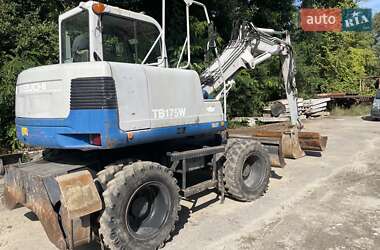 Колесный экскаватор Takeuchi TB 2007 в 