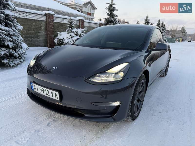 2022 Tesla Model 3, VIN 5YJ3E1EB5NF174654:plate — фото 1 (autoria)