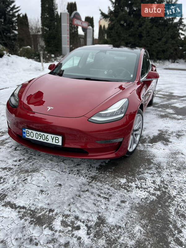 2018 Tesla Model 3, VIN 5YJ3E1EB7JF065574:plate — фото 1 (autoria)