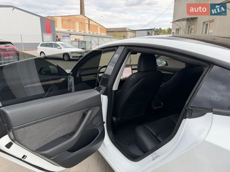 Tesla Model 3 2023 VIN 5YJ3E1EC8PF661536 фото оголошення 9 з 31