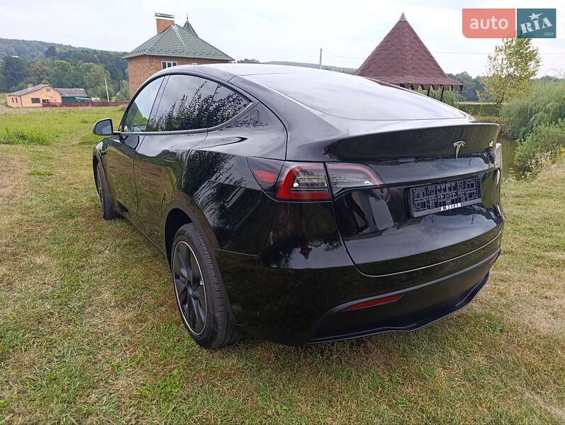 Позашляховик / Кросовер Tesla Model Y 2024 в Сторожинці