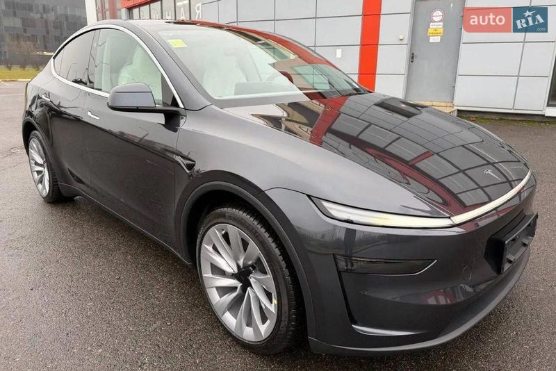 2025 Tesla Model Y, VIN 7SAYGDEE6TF325724:plate — photo 1 (autoria)