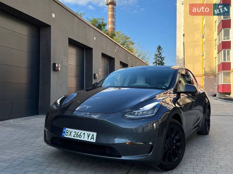 2021 Tesla Model Y, VIN 5YJYGAEEXMF183598:plate — фото 1 (autoria)